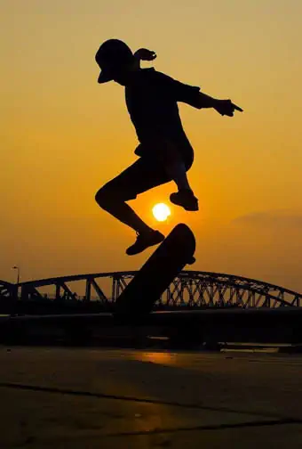 skateboarder in the sunset